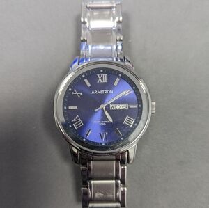 Mens Gently worn Armitron PC33 watch. Works great. Looks great!